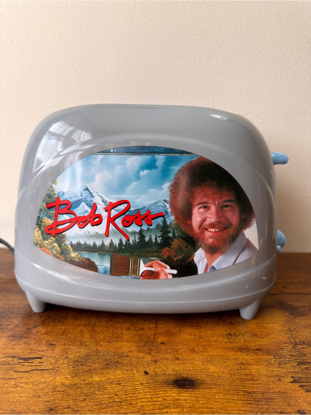 Uncanny Brands Bob Ross 2-Slice Toaster Toasts Face Onto Bread Gray